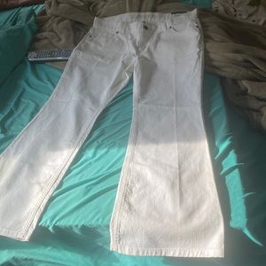 White lands and tags still on jeans kind of bellbottoms referred to picture